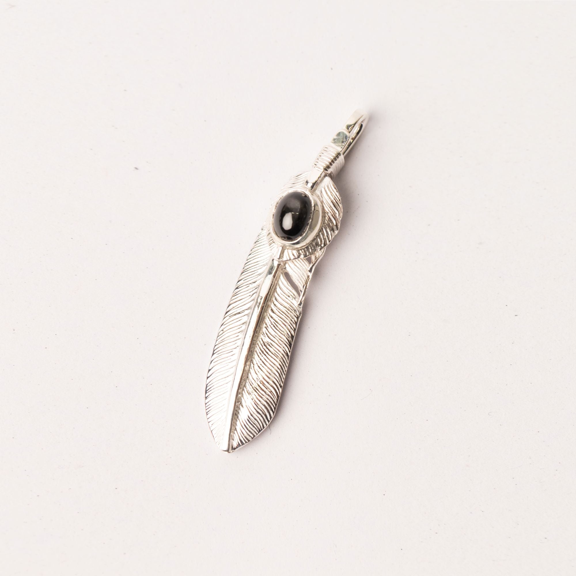 P-517R Feather with black star and heart feather (M)