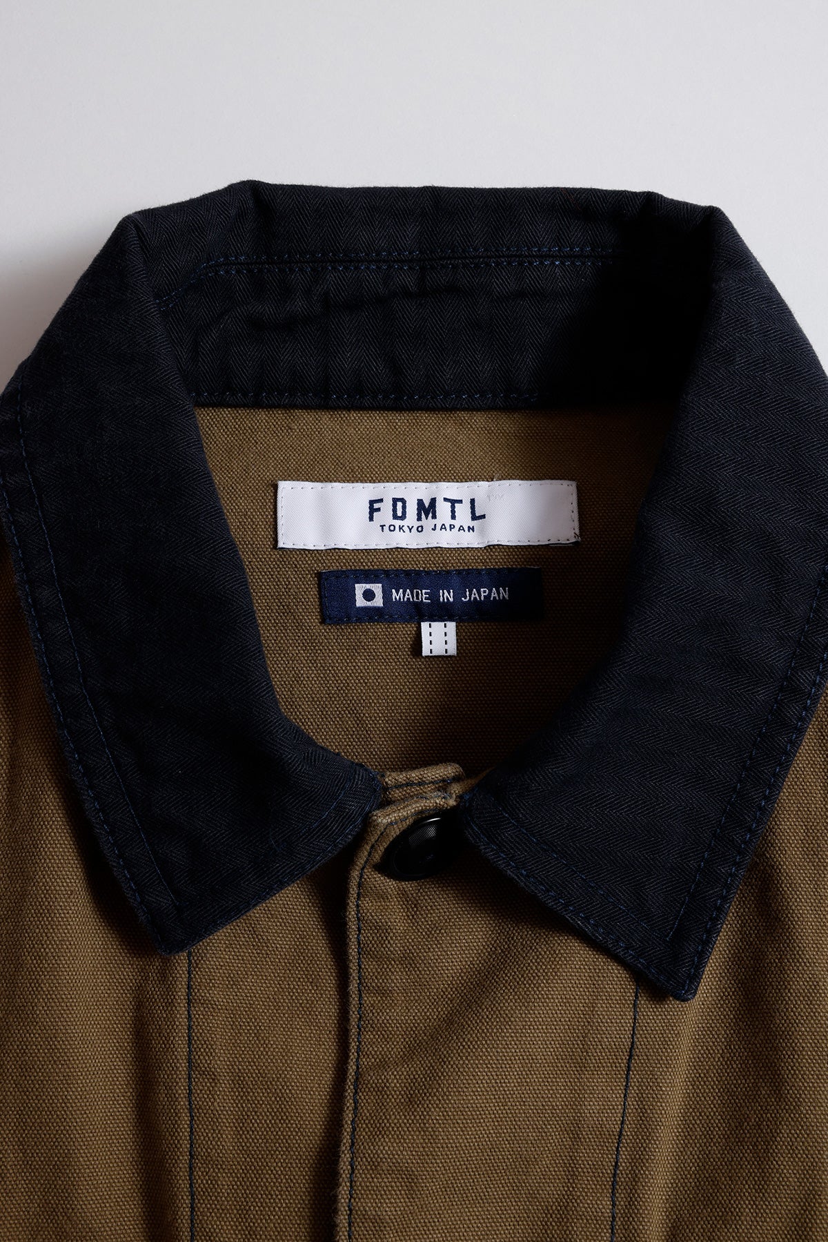 PATCHWORK COVERALL JACKET RINSE (FA26) - KHAKI