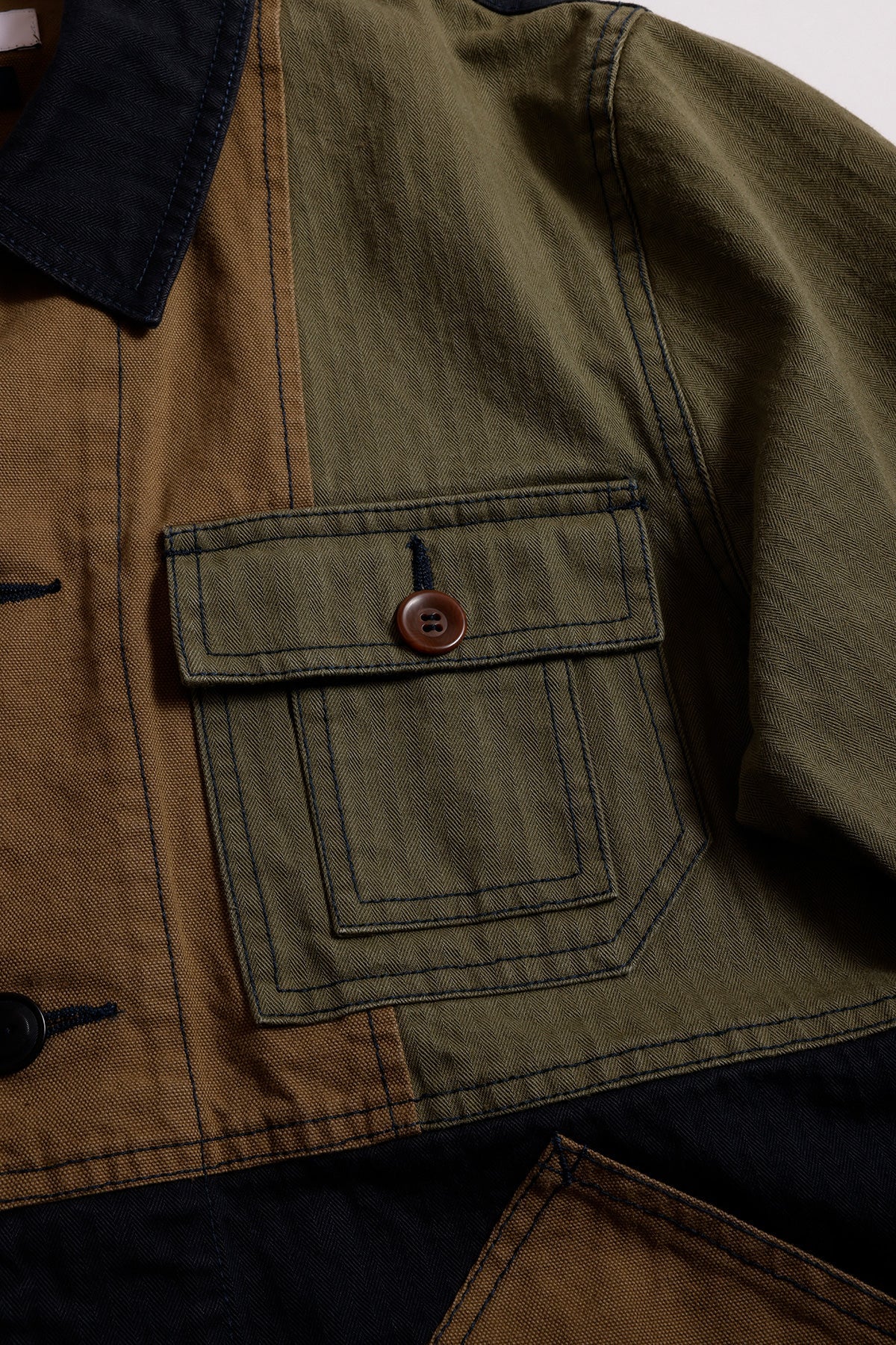 PATCHWORK COVERALL JACKET RINSE (FA26) - KHAKI